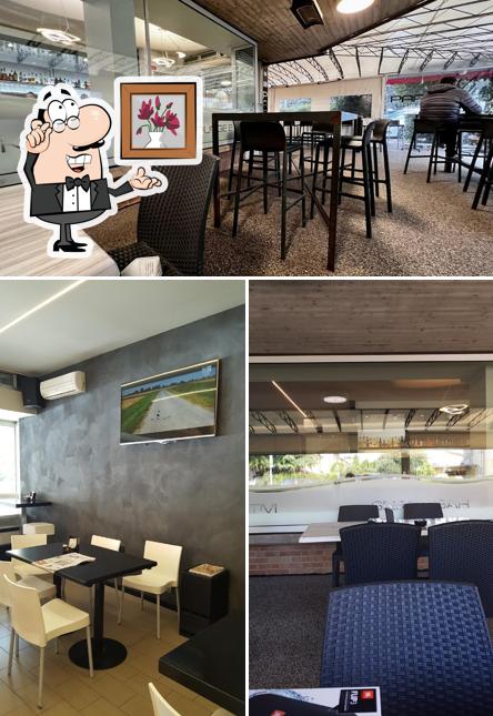 Dai un'occhiata agli interni di Papi Cafè