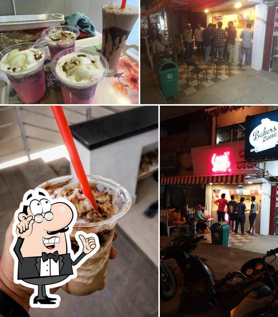 Take a look at the image displaying interior and drink at Lassi Shop