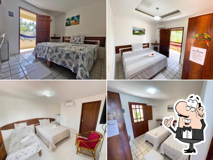 Sente em uma das mesas no Pousada Lua Cheia