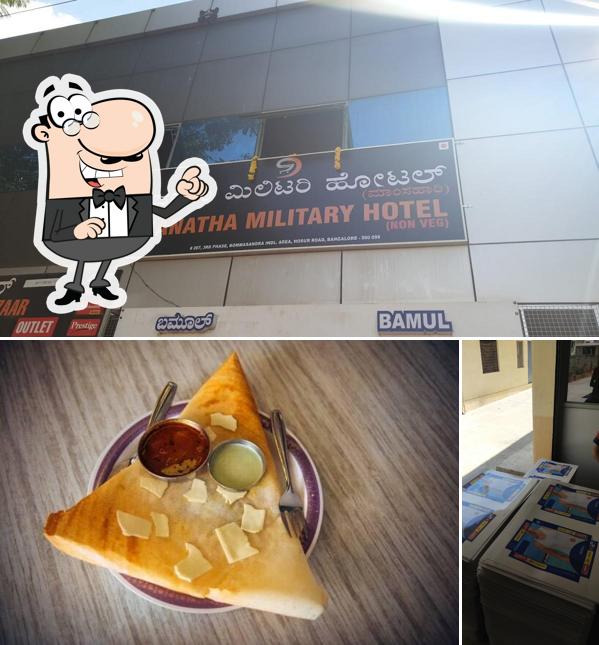 The picture of JANATHA Tiffins’s interior and exterior