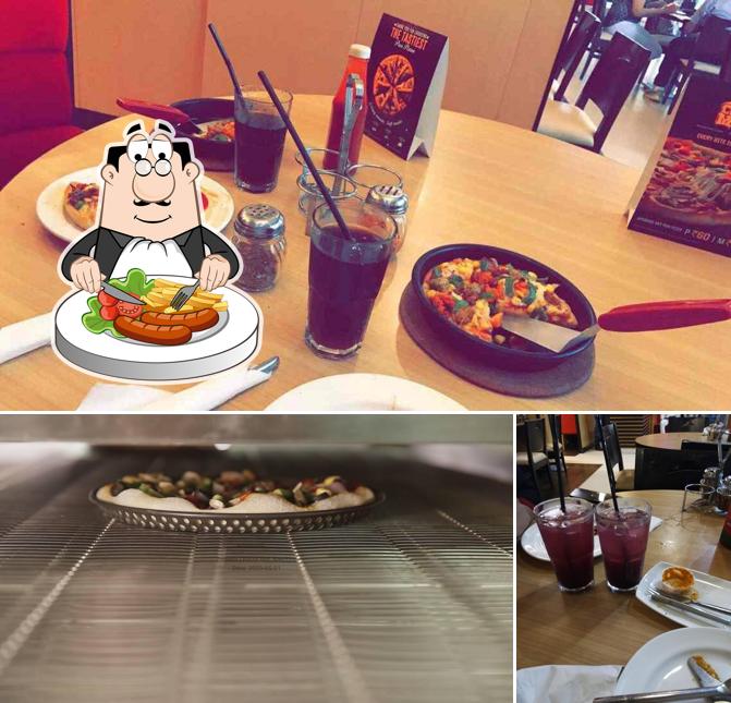 This is the photo depicting food and dining table at #NA