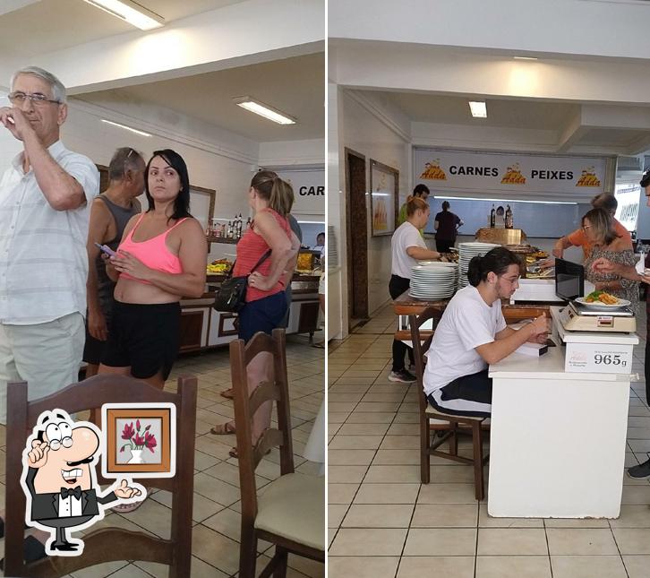 O interior do Restaurante Dona Adda. meia praia , Itapema