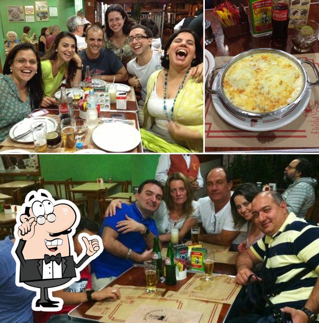 A foto do Pizzaria a Original’s interior e comida