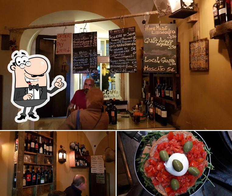 Guarda la immagine che presenta la interni e cibo di Spuzzulè Winebar