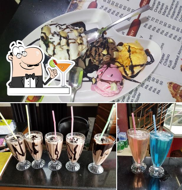 Among various things one can find drink and dessert at Sensation cafe & Restaurant