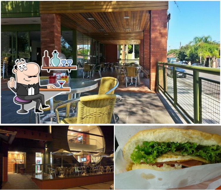 A interior e sanduíche do restaurante