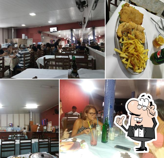 O interior do Restaurante e Pizzaria Marlin Azul