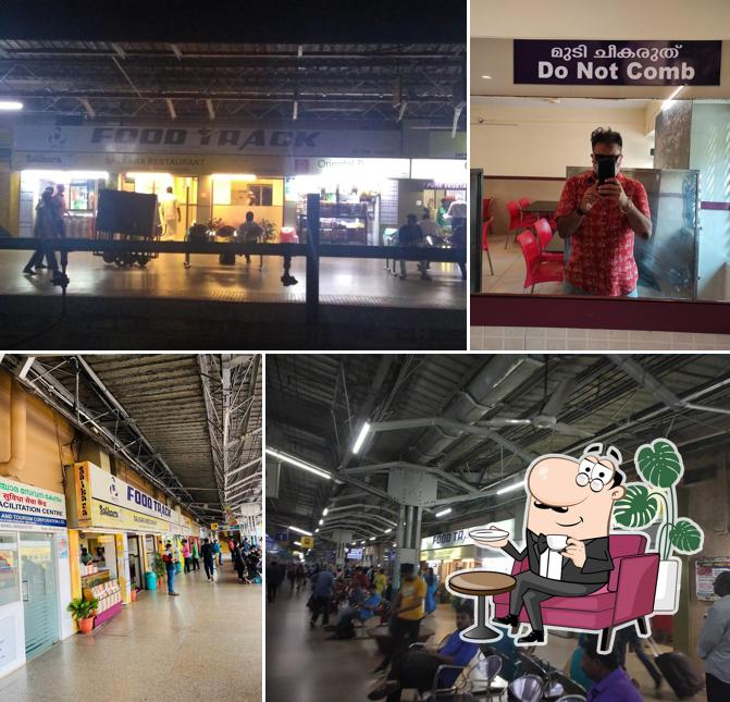 Take a seat at one of the tables at Salkara Restaurant, Railway Station, Kozhikode