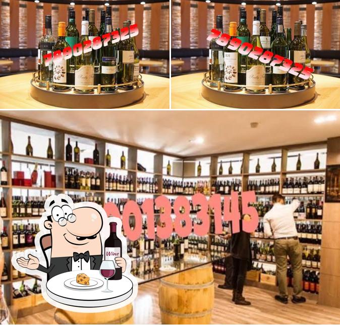 Enjoy a glass of wine at Liquor Store name: Model Shop