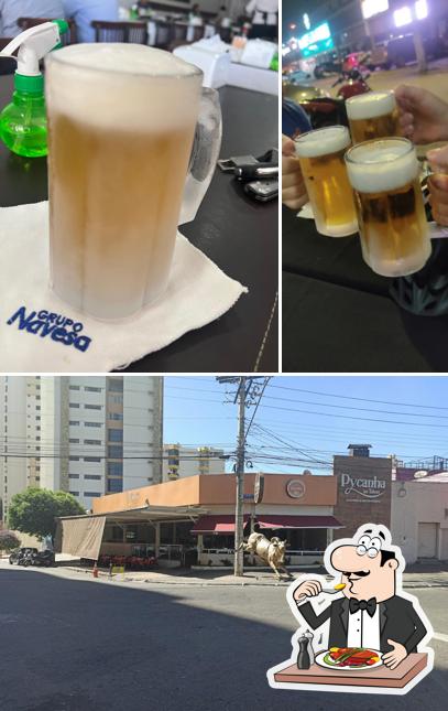 A foto a Pycanha Na Tábua’s comida e exterior