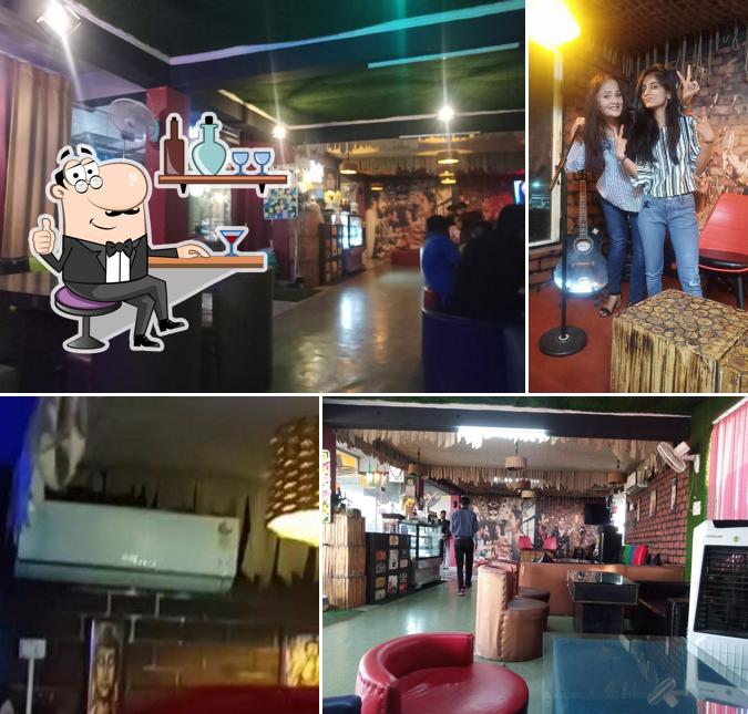 Take a seat at one of the tables at 3 way cafe & lounge