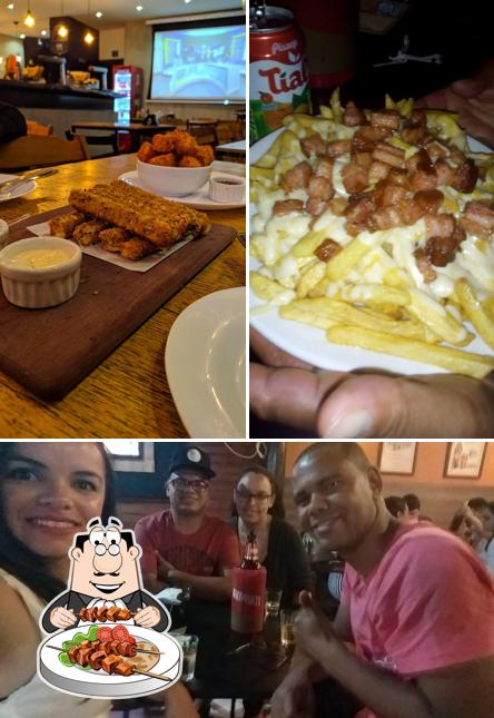 A imagem do Armazém Snooker Bar aberto de terça a domingo,feriados e véspera de feriado.’s comida e interior