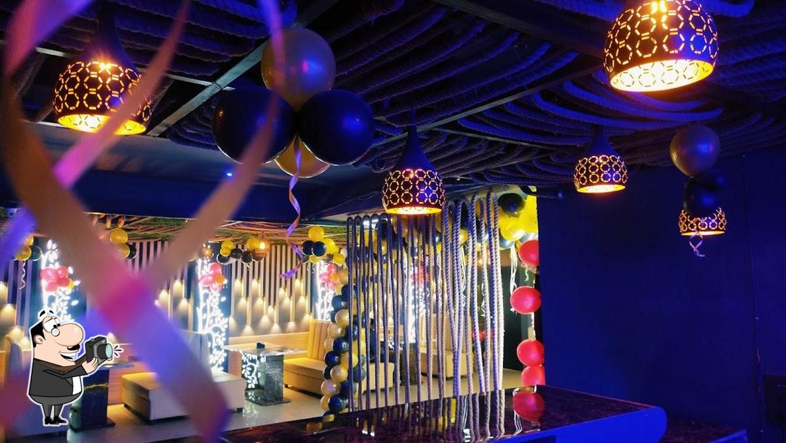 Look at the picture of The Midnight Cafe (TMC)