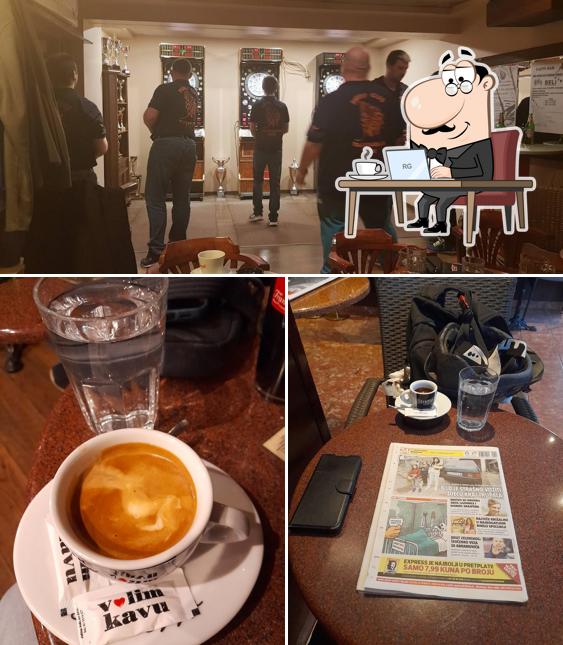 Questa è la immagine che mostra la interni e cibo di Caffe bar A1