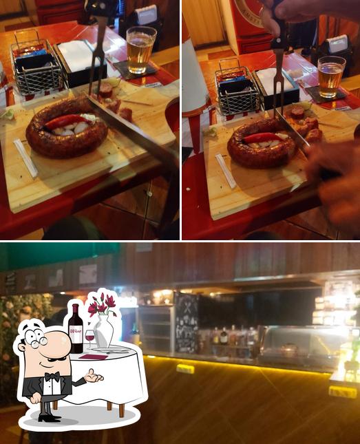 A ilustração da mesa de jantar e interior a Bar Calçada da Fama