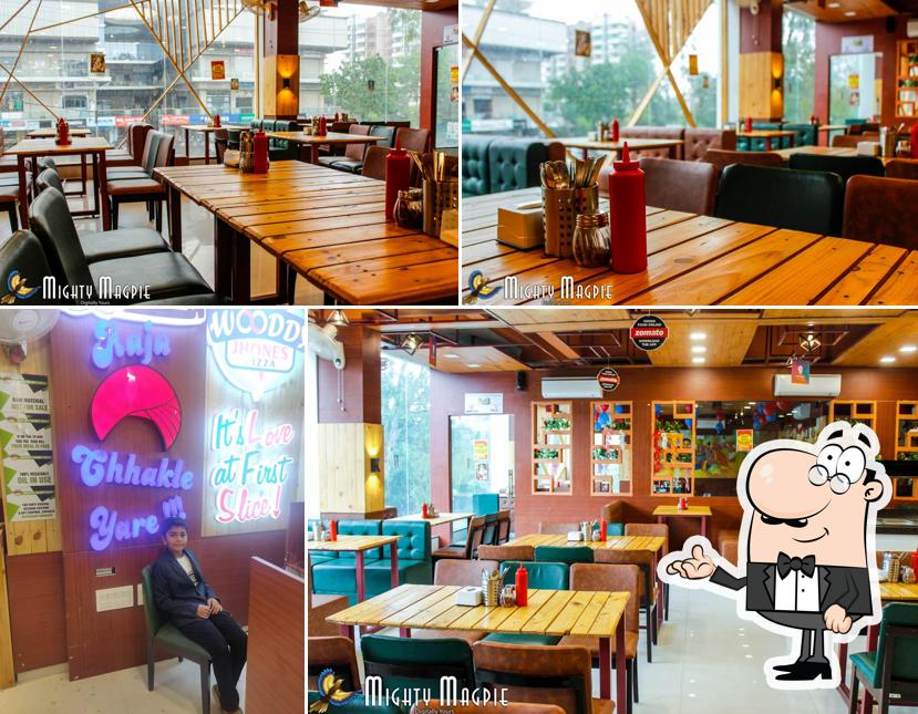 Take a seat at one of the tables at Oyee Yaree! Kulche parrathe Vapi