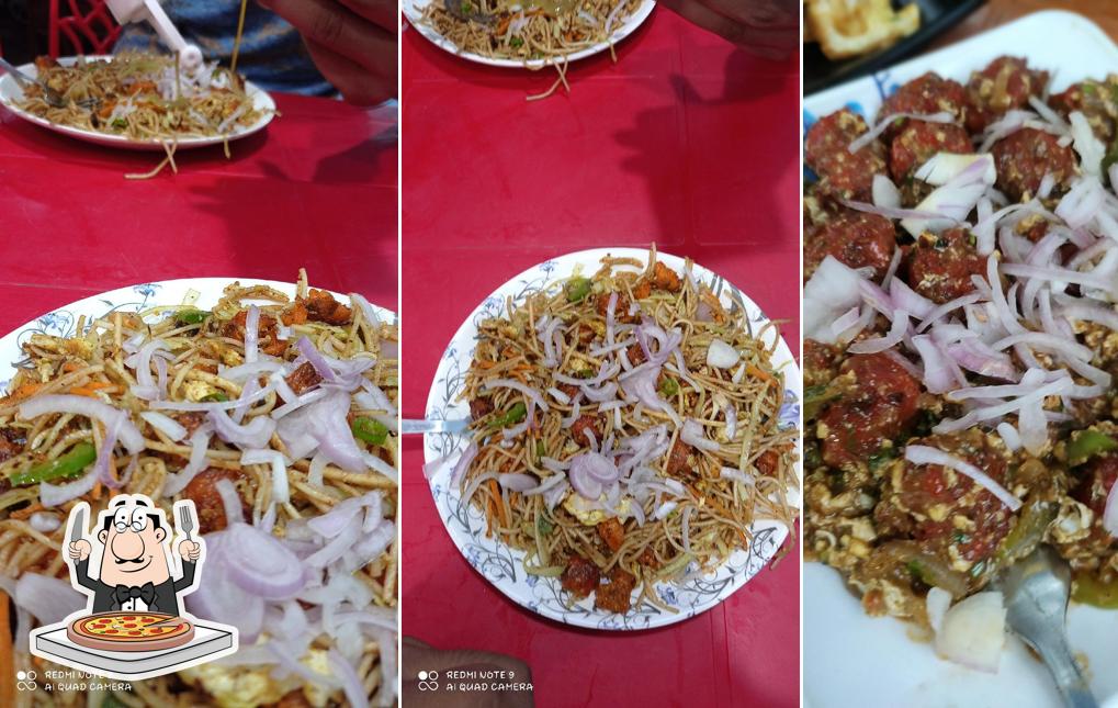 Pick pizza at AMLAN FAST FOOD CENTER