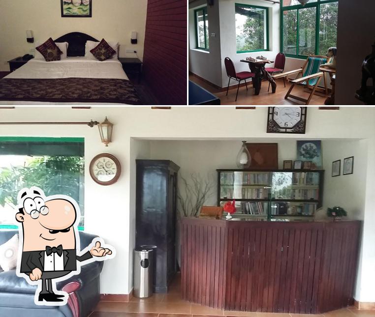 Take a seat at one of the tables at Camelot Resort Munnar