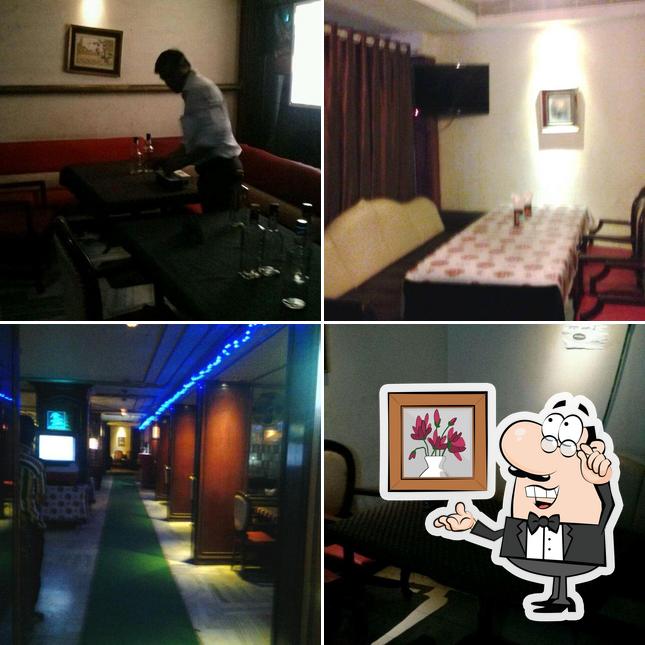 Take a seat at one of the tables at Classic Bar & Restaurant