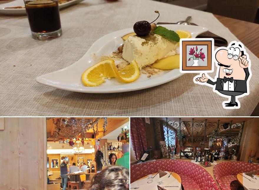 Tra le diverse cose da Pizzeria Ristorante Salvan - Corvara in Badia (bz) si possono trovare la interni e bevanda