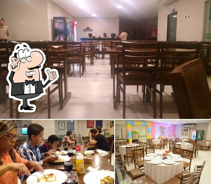 O interior do Pizzaria Água na Boca