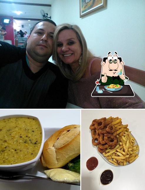 A ilustração da comida e interior no Caldinho da Joana Satélite