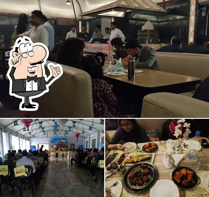 Take a seat at one of the tables at Reda Restaurant & Banquet Banquet Hall in Uttarpara Family Restaurant in Uttarpara