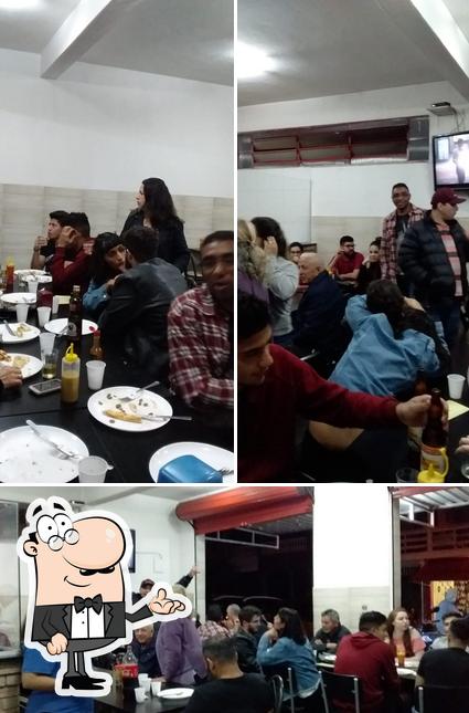 O interior do Pizzaria Primeiro Mundo