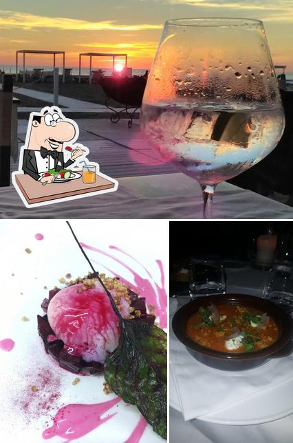 Dai un’occhiata alla foto che presenta la cibo e vino di L'orsa Maggiore