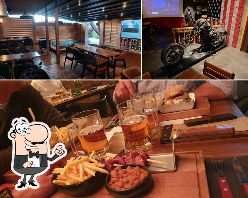 Dai un'occhiata agli interni di Baraka BBQ & Brew Bar
