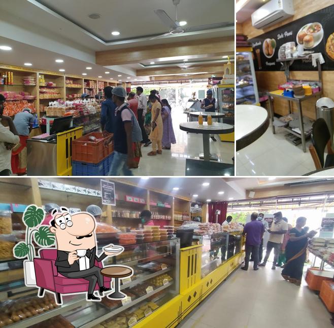 Take a seat at one of the tables at Aswins Sweets & Snacks