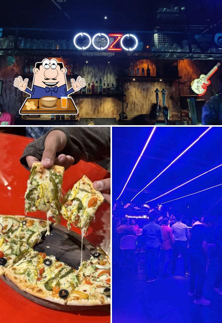 Check out the photo showing food and bar counter at LVEL Bar & Diner