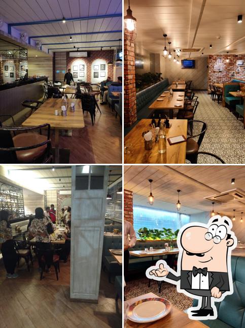 Take a seat at one of the tables at Kailash Parbat