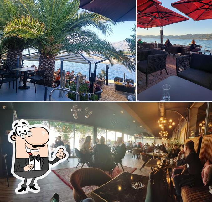 Siediti a un tavolo di Kavana Procaffe