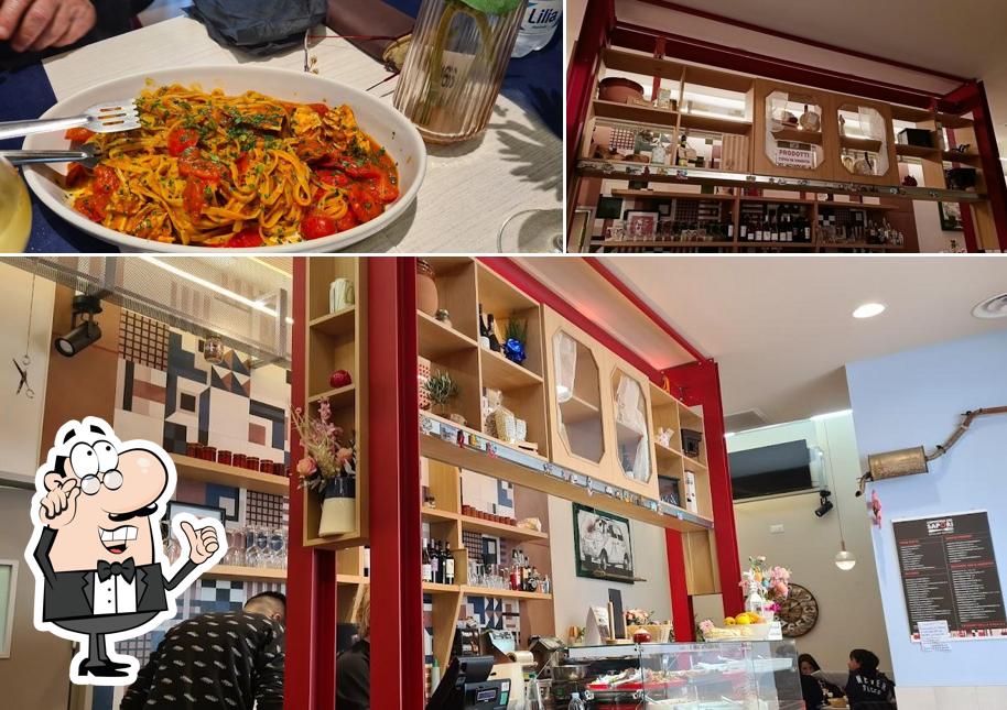 Questa è la immagine che mostra la interni e cibo di L'Officina dei Sapori