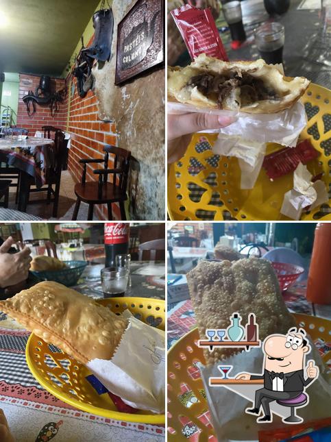 Sente em uma das mesas no Pastéis Colono