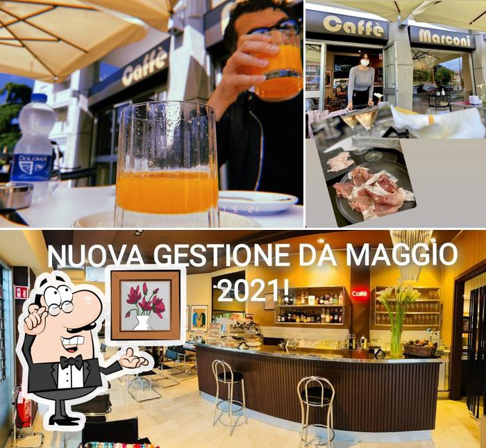 Siediti a un tavolo di Caffè Marconi