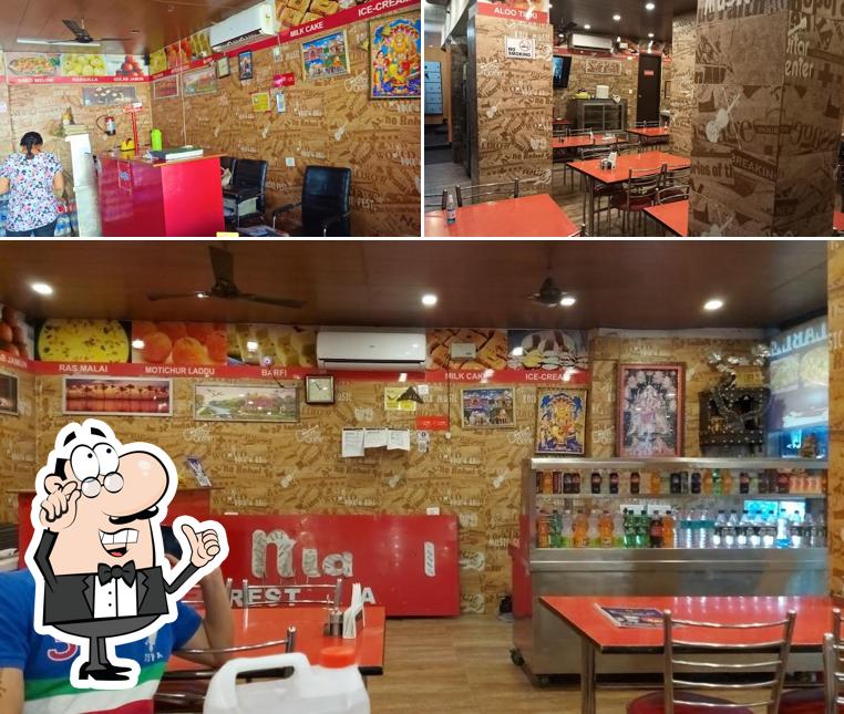 Take a seat at one of the tables at Moti Mahal Inn, Rishikesh