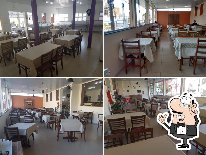 O interior do Restaurante Tempero & Arte