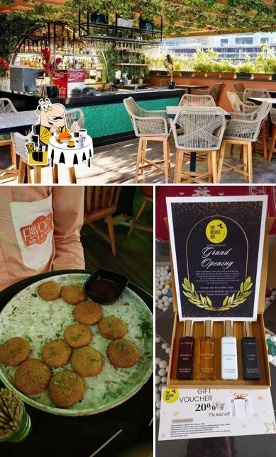 Check out the photo displaying food and interior at The Botanic Bay