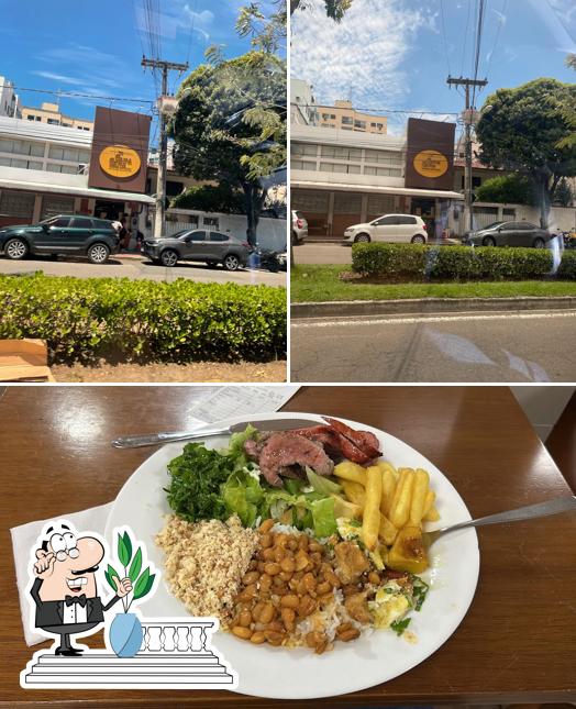 A imagem do Restaurante Come Come’s exterior e comida