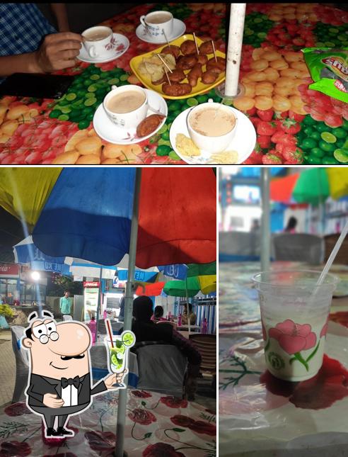 Enjoy a beverage at Dinhata Coffee House