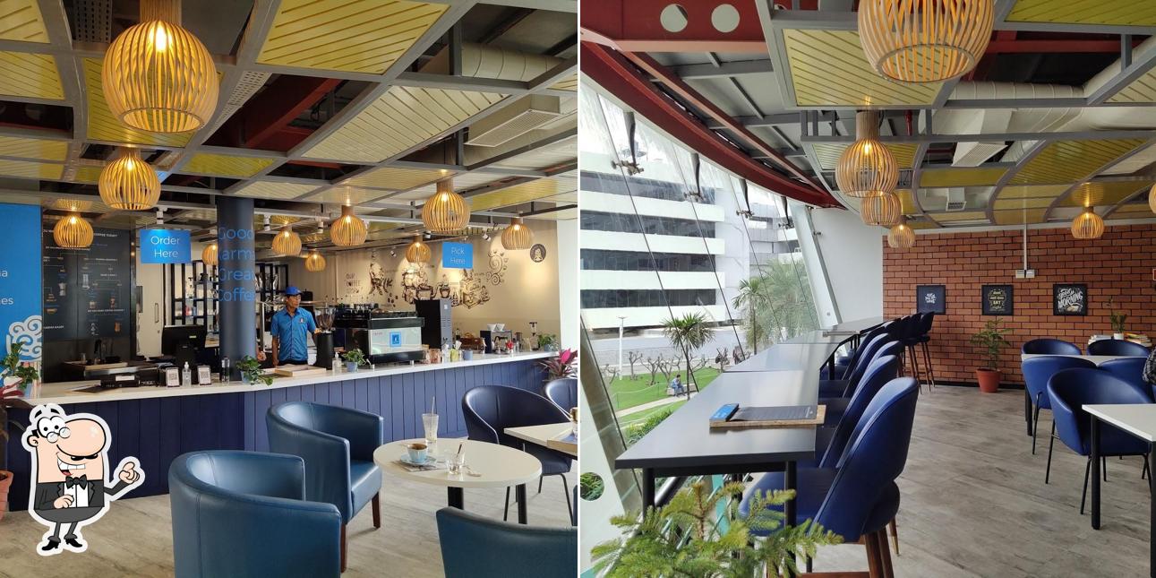 Take a seat at one of the tables at KARMA KAAPI EGL