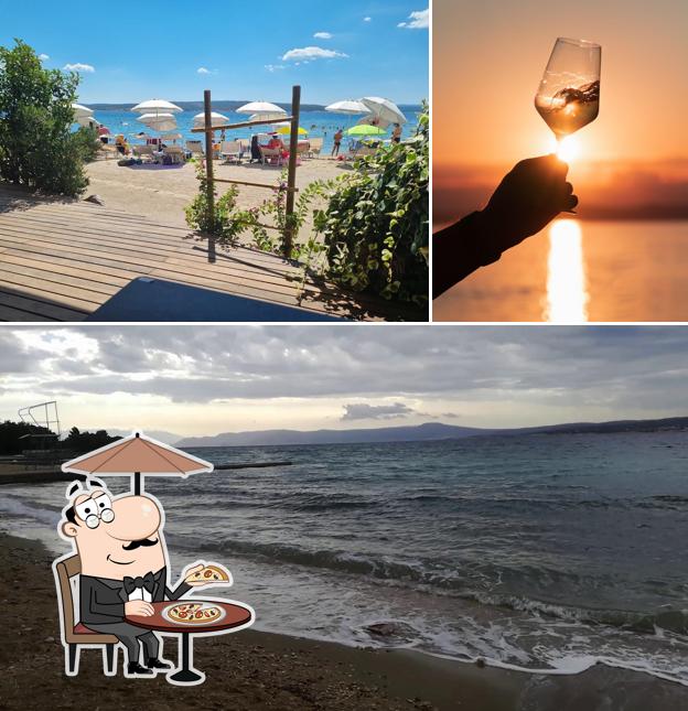 Curiosa tra la parte esterna di SABBIA Restaurant, lounge bar & night club