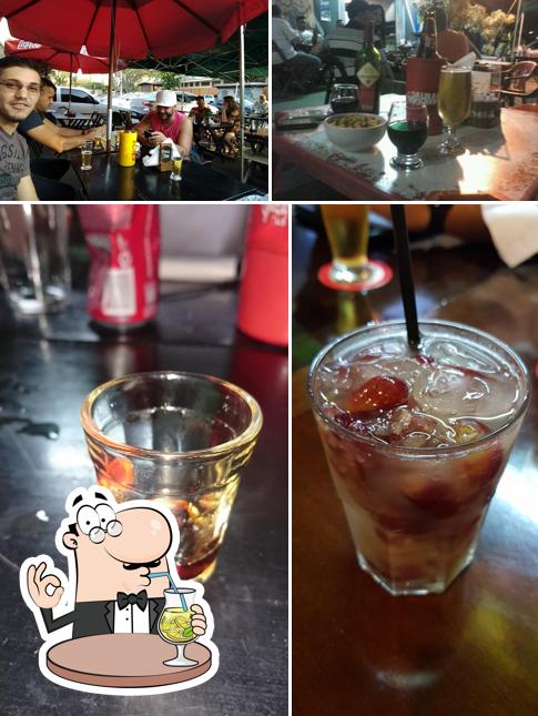 A imagem a Adega & Pub Terra Nova’s bebida e balcão de bar