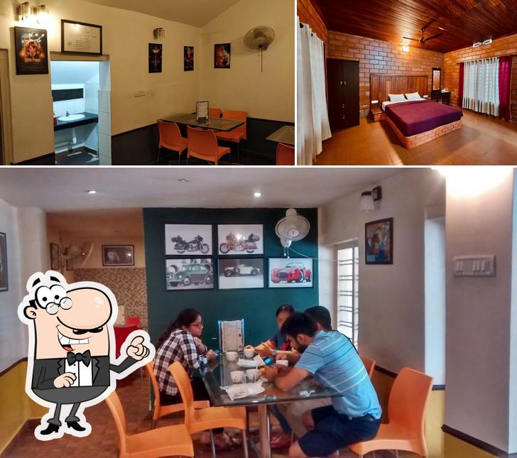 Take a seat at one of the tables at CG Ala - The Coffee Grove