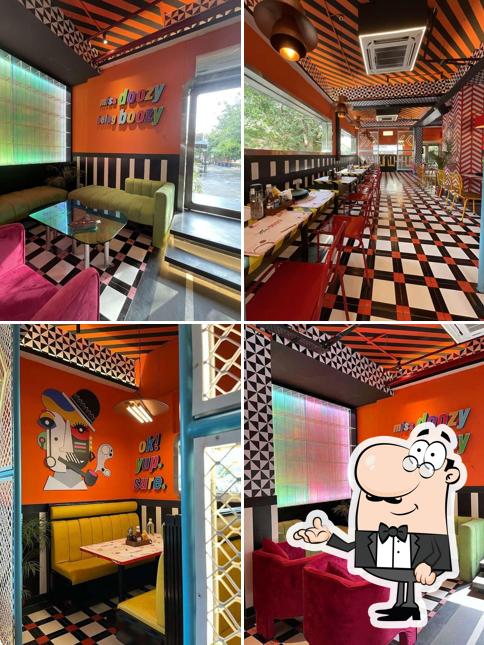 Take a seat at one of the tables at Miss Doozy