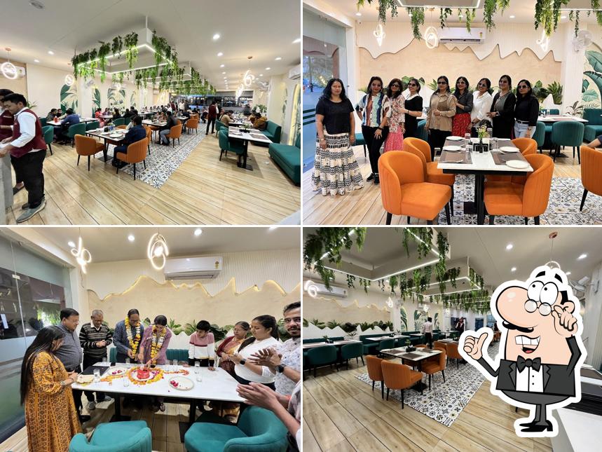 Take a seat at one of the tables at Naveen's Bapu Ki Kutia, Ujjain