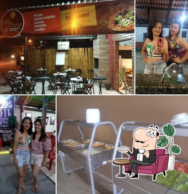 O interior do Na Brasa Restaurante e Pizzaria