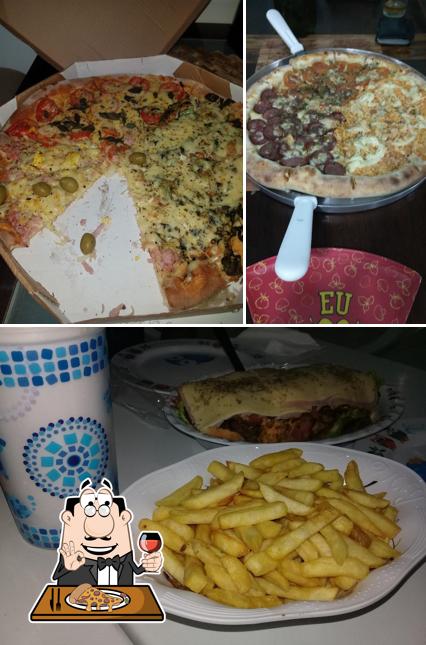 No PIZZARIA HORA EXTRA FAZENDA, você pode desfrutar de pizza